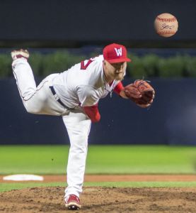 Red Sox Pitcher throwing ball